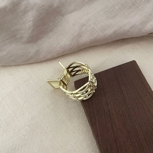Elegant gold hollow geometric metal hair claw clip with rhinestones for women