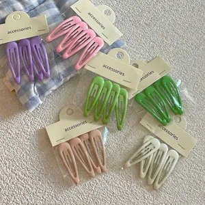 Set of 4 candy-colored matte snap hair clips for girls in various pastel shades