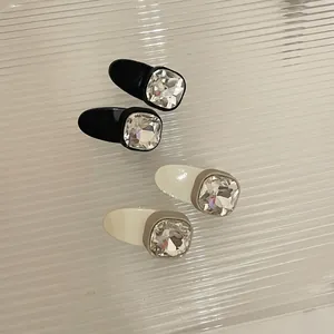 Set of black and white square crystal hair clips with vintage resin bases and rhinestones