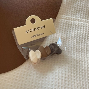 Three-piece set of heart-shaped matte hair claw clips in beige, brown and charcoal grey