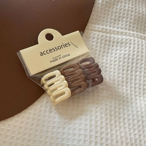 Three-piece set of matte milk tea color hair claw clips for elegant ponytail styling