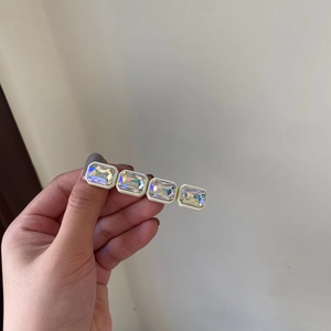 Rectangle hair clip with four iridescent crystals and cream frame for elegant styling