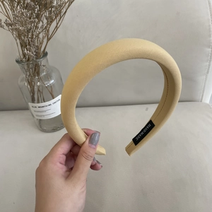 Morandi light yellow sponge headband with thick fabric texture and handmade label design