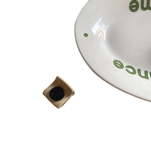 Minimalist beige square hair claw clip with black smiley face design for women