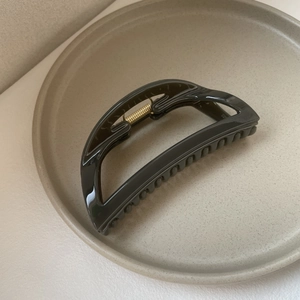Morandi dark grey large claw clip with metal spring on a ceramic plate for women