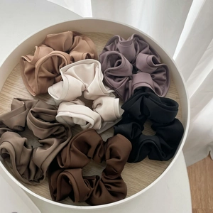 Detailed set of six premium oversized satin scrunchies in elegant neutral earth tones