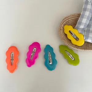 Five-piece colorful wavy cloud hair clips in bright acrylic finish for girls and women