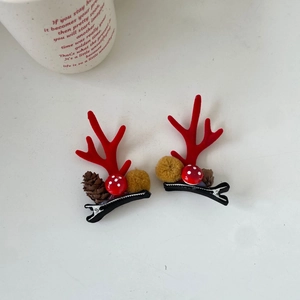 Christmas reindeer antler hair clips with pine cones and mushrooms on duckbill clips