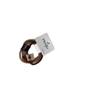 Set of 4 high-elasticity earth-tone hair bands with decorative cloth labels and paper card