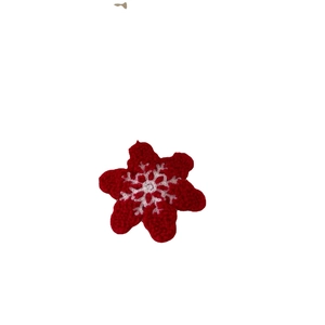 Handmade red crochet snowflake hair clip accessory with white embroidered details
