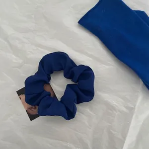 Elegant Klein blue scrunchie hair tie made of soft fabric for women hair accessories
