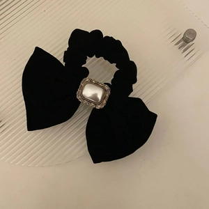 Elegant black velvet hair clip with large bow and rectangular pearl in a vintage silver frame