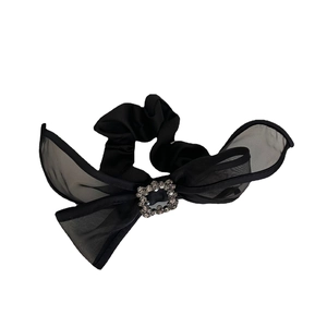 Elegant black mesh bow hair tie with a sparkling square rhinestone center on white backdrop