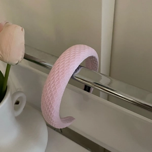 Pink waffle texture sponge headband with wide design and non-slip lining for women