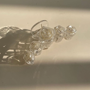 Elegant white camellia flower hair claw clip with glossy resin finish for women