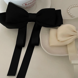 Large satin bow hair clip with long ribbons in black and beige, elegant French style accessory