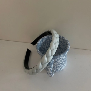 Light blue braided twist headband with silver glitter finish for women hair styling