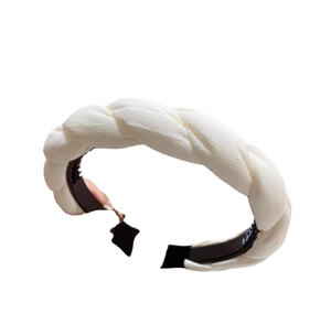 White twisted braid headband with pleated fabric texture and non-slip inner grip teeth