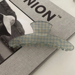 Large light blue checkerboard acetate hair claw clip on art magazine cover