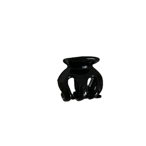 Petite pince à cheveux noire brillante classique avec design à dents multiples