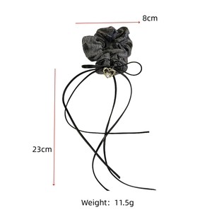 Grey textured scrunchie with long ribbons and a gold heart pendant, 8cm diameter size