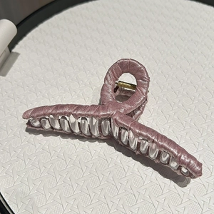 Pink satin fabric hair claw clip with strong transparent teeth and gold metal spring
