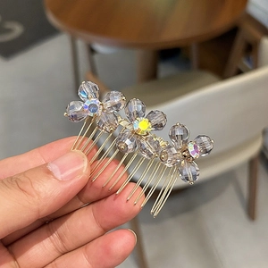 Exquisite crystal hair comb with three purple floral petals and gold prongs for women