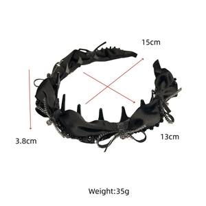 Detail view of black satin bow headband with chain tassels and size dimensions