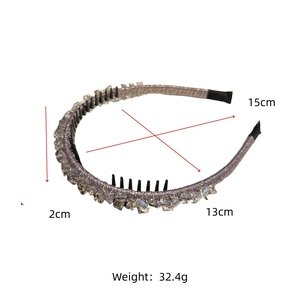Detail view of purple braided rhinestone headband with teeth and dimensions marked