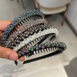 Detail of five non-slip hairbands with faceted crystal beads in multiple colors