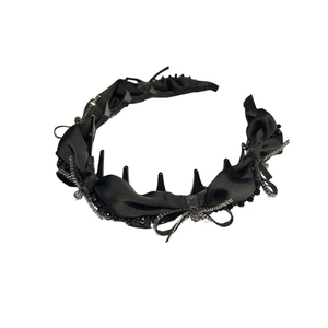 Elegant black bow headband with satin fabric, beads, and silver metal chain detail