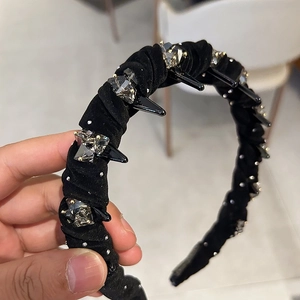 Punk style black velvet headband with grey crystals and metal spikes for women