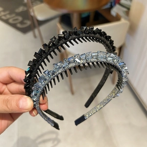 Detailed close-up of non-slip headband with hand-set sparkling crystals and inner teeth