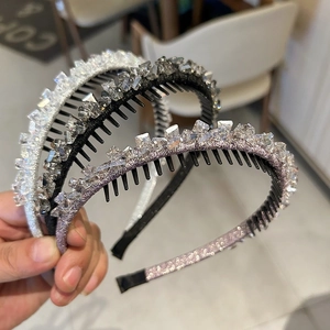 Detailed view of three sparkling rhinestone non-slip headbands in silver, black and lilac