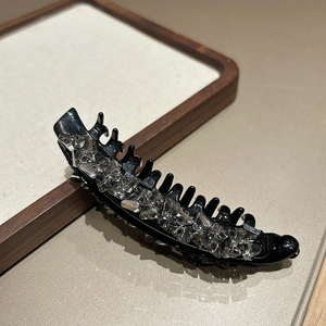 Elegante fermaglio a banana grande con cristalli grigi su base nera per acconciatura