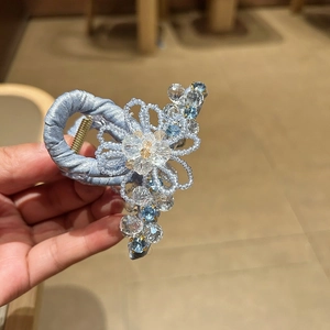 Blue silk crystal flower hair claw clip with beaded floral design for elegant styling