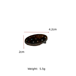Detail showing dimensions of tortoiseshell hair clip with colorful rhinestones