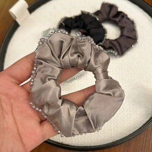 Elegant satin scrunchies with crystal bead edges in mauve, black and dark brown shades