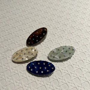 Tortoiseshell resin hair clips with sparkling rhinestones in a four-piece elegant set