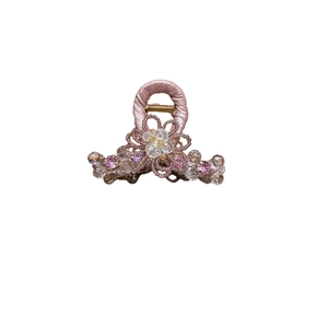 Elegant floral crystal hair claw clip with pink satin fabric and sparkling rhinestones