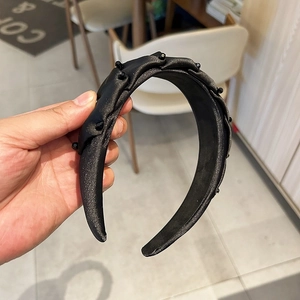 Elegant black hand-sewn crystal headband with wide pleated fabric and beads
