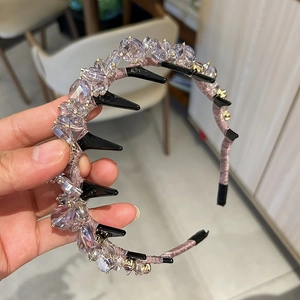 Detail of light purple crystal headband with silk fabric wrap and built-in hair combs