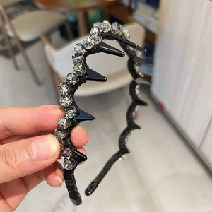 Elegant crystal beaded headband with shark-tooth comb design for secure hair styling