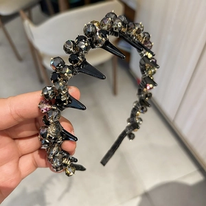 Luxurious rhinestone wavy headband with dark gems, punk spikes and non-slip teeth for women