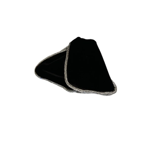Elegant black velvet hair clip with sparkling rhinestone edges in a minimalist luxury style