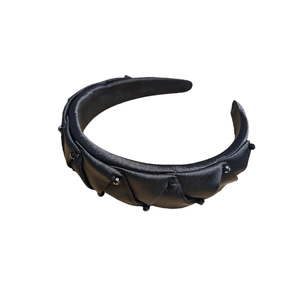 Elegant padded black satin headband with pleated texture and crystal bead embellishments