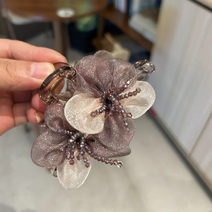 Elegant organza flower hair claw clip with crystal beads for bun hairstyles