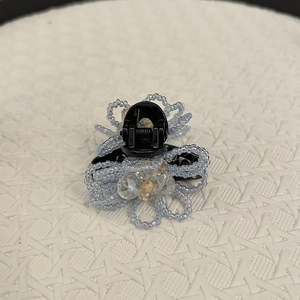Elegant light blue crystal flower hair claw clip with beaded petals for women's updos