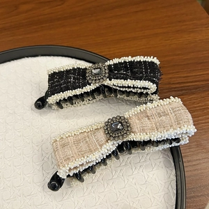 Elegant tweed bow banana clips set in black and beige with pearl trim and rhinestones
