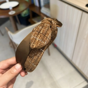 Elegant brown tweed knotted headband with bow for women, stylish vintage hair accessory